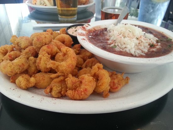 Cafe Rue Orleans signature dishes Creole Shrimp and Grits, Eggs Pontchartrain, Catfish Tchoupitoulas, Crawfish Étouffée, Gumbo